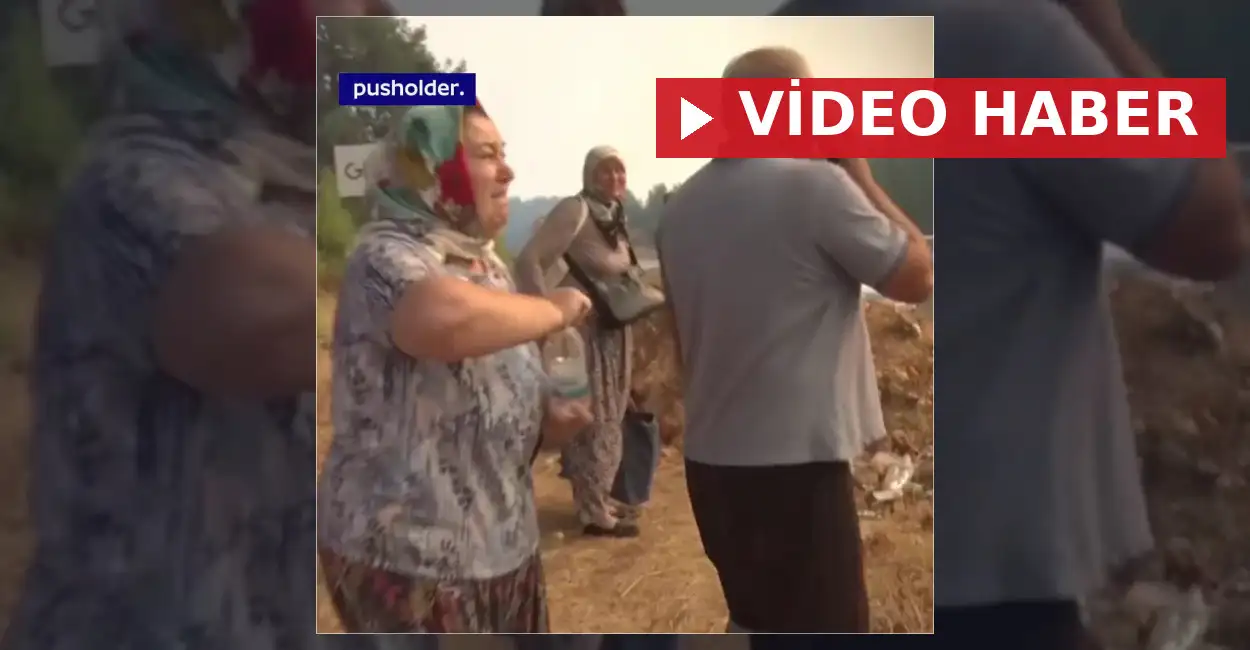 Antalya'nın Aksu ilçesinde etkisini sürdüren orman yangını sebebiyle evlerini boşaltmak