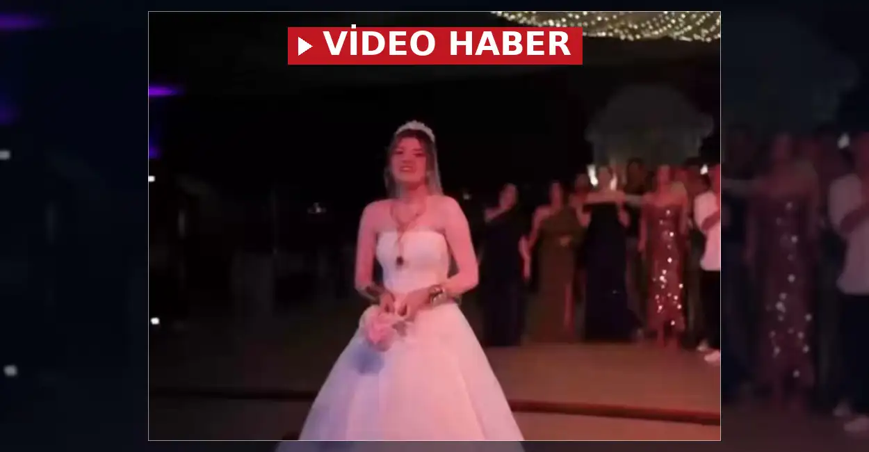 Balıkesir'de bir düğün töreninde gelinin attığı çiçeği yakalamak isteyen genç,