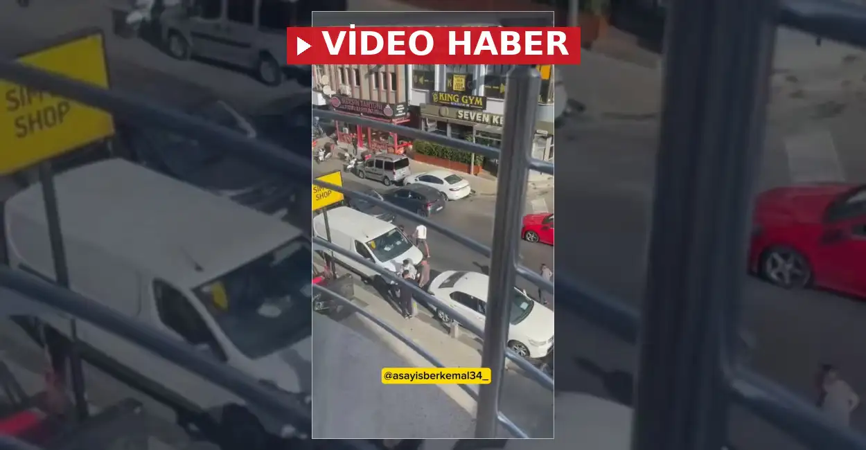 Cadde üzerinde karşıdan karşıya geçen bir vatandaş ile araçdekiler arasında