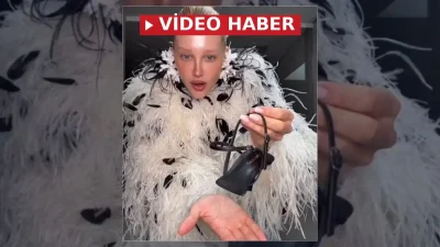 Malu Borges ayağının yalnızca yarısını kaplayan sıra dışı yeni topuklu