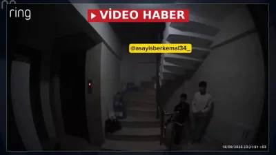 İstanbul Sancaktepe'de bir apartmana giren iki şüpheli, bina sakinlerine ait